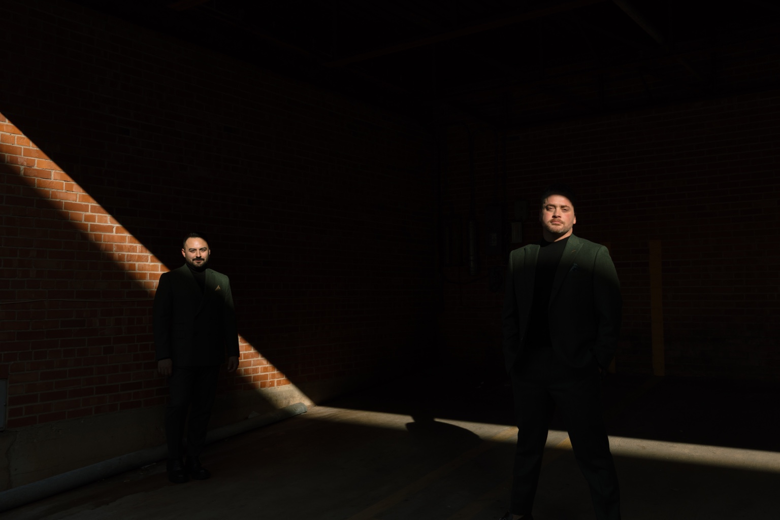 Andrew and Juan Carlos together in a nighttime portrait